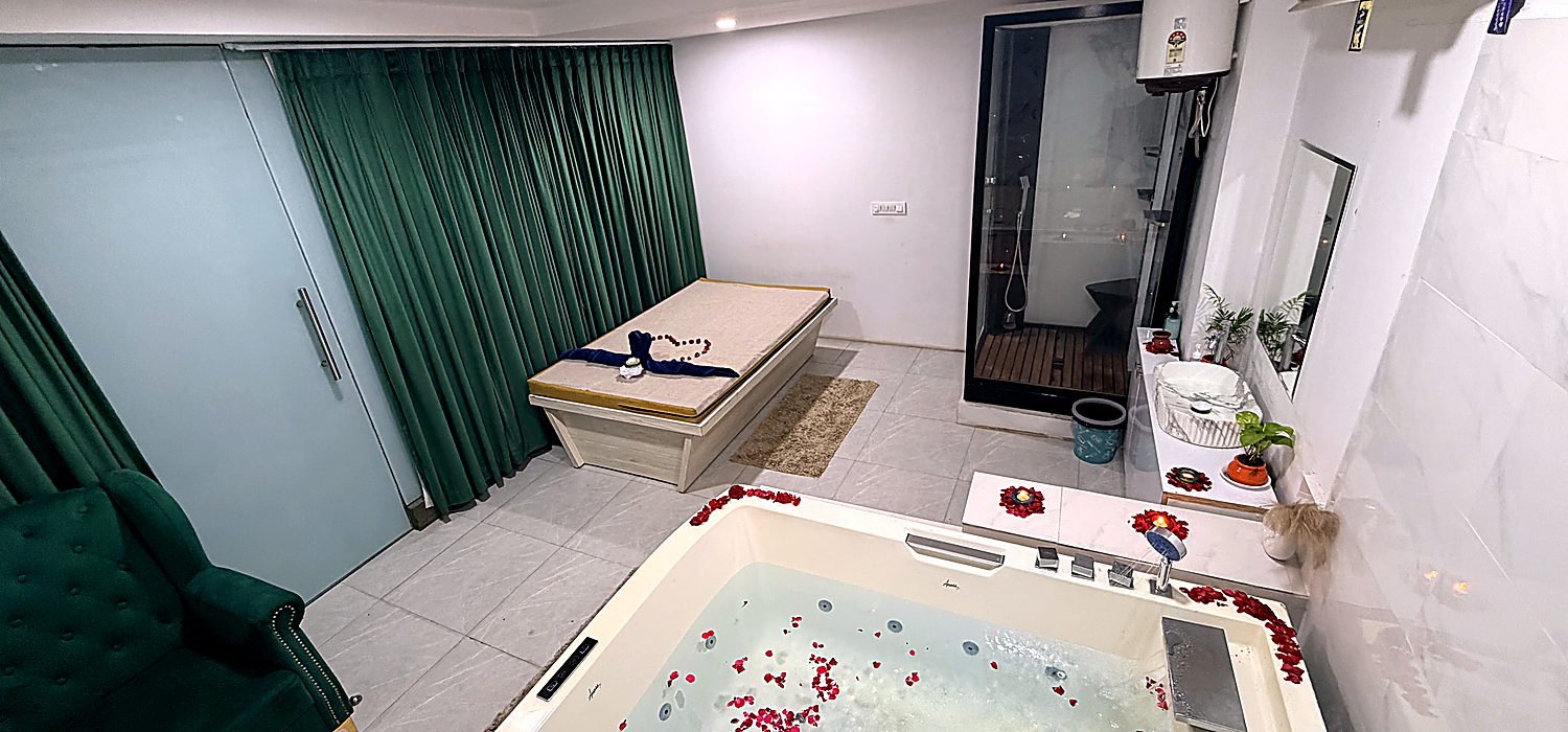 Couple jacuzzi suite with rose petals