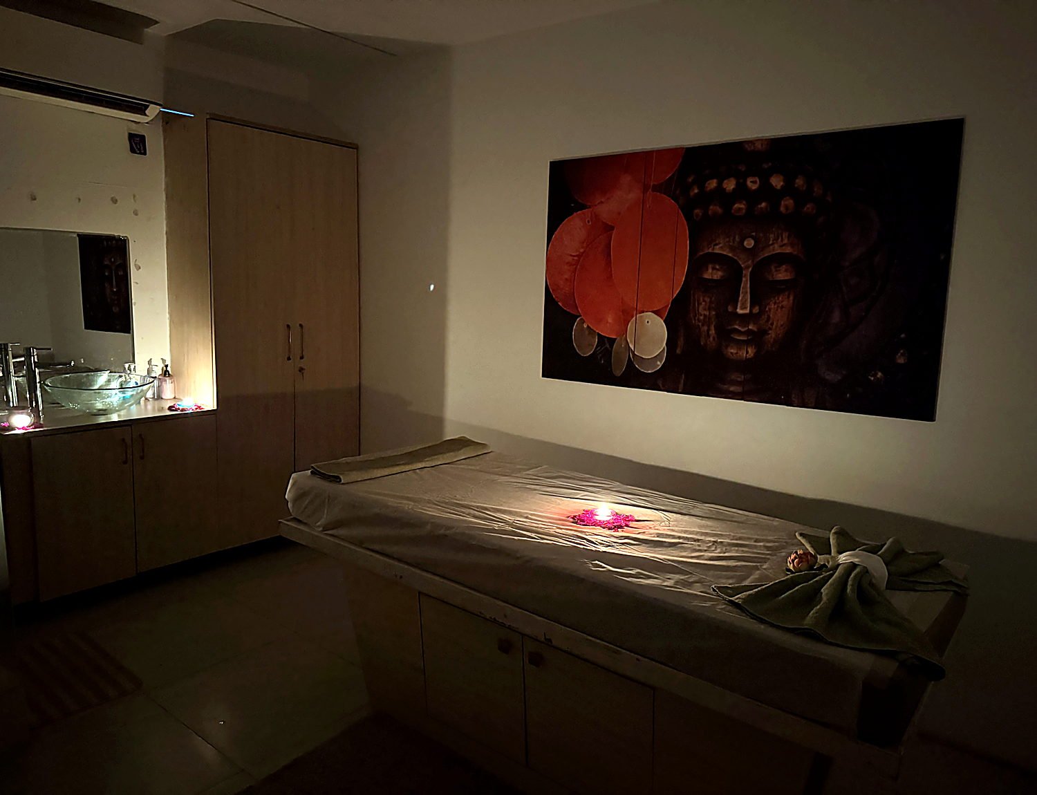 Candle-lit signature ritual room at Vaayu Wellness Spa near the Financial District