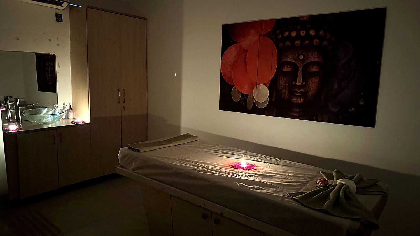 Candle-lit massage room at Vaayu Wellness Spa